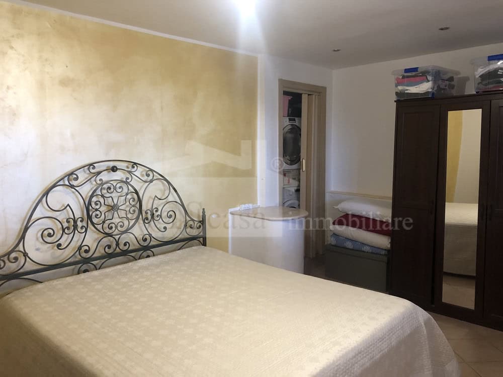 Villa a schiera bilivelli con giardino
