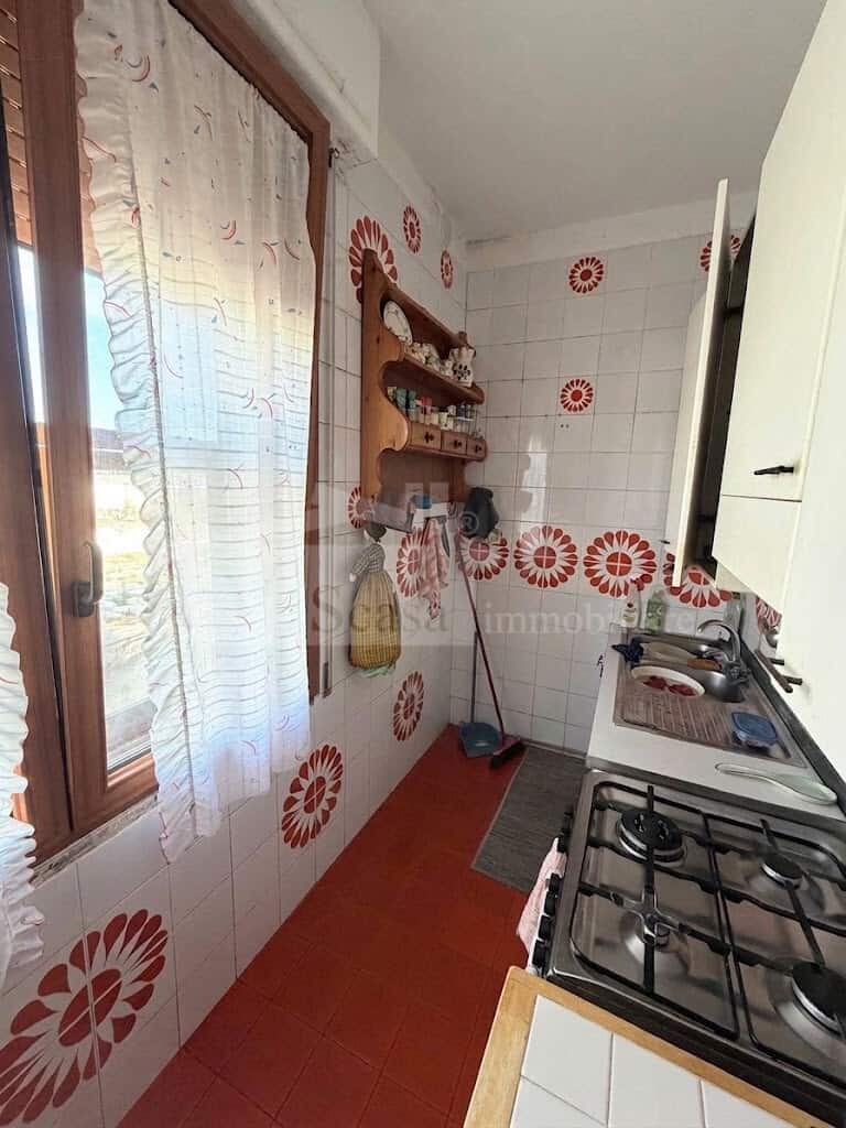 Ampio appartamento in villa bifamiliare – con box, mansarda e giardino